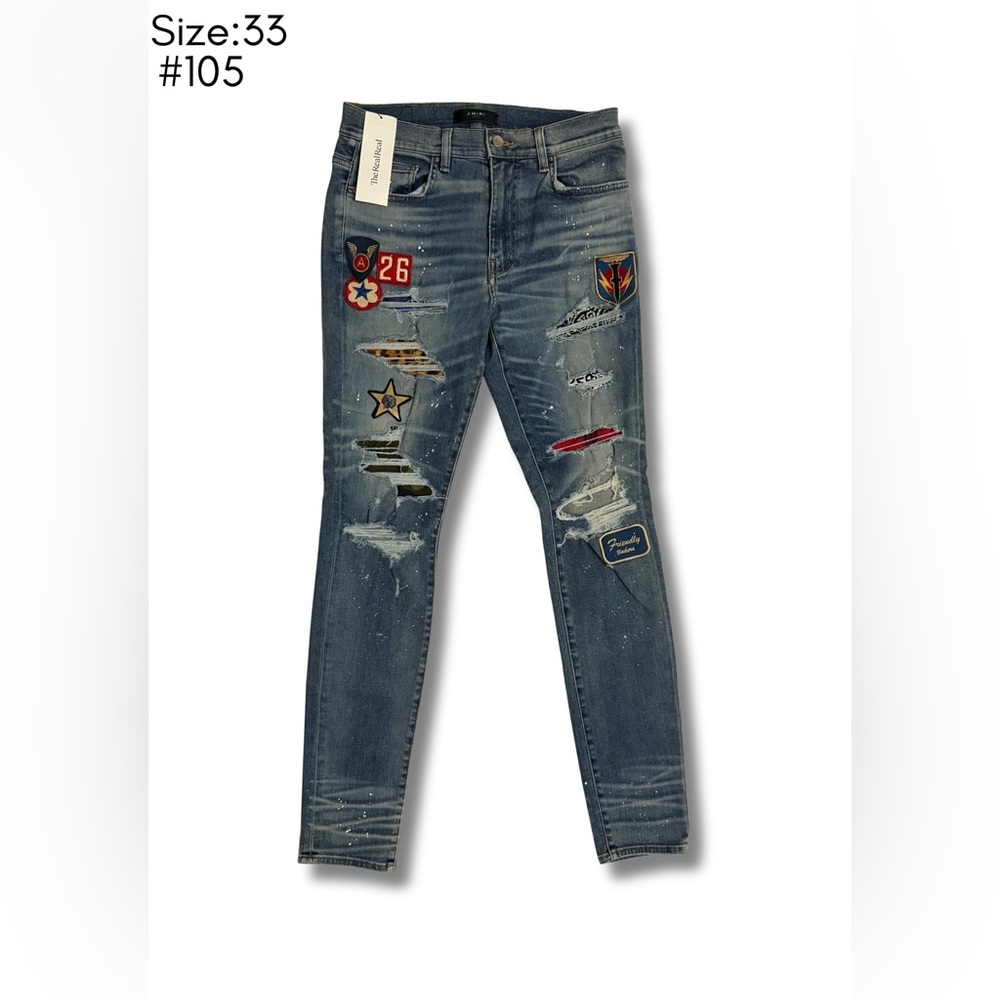 AMIRI Distressed Blue Denim with assorted patches & badges